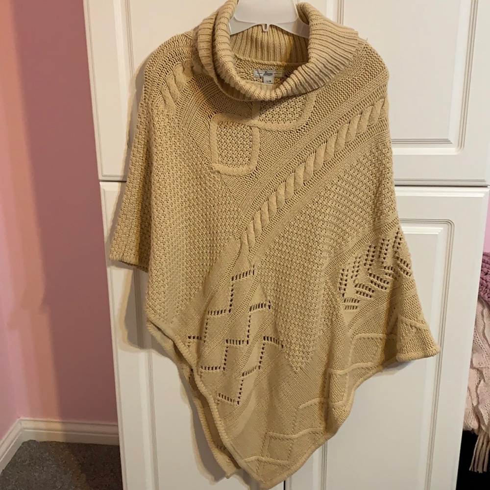 Turtleneck cable knit poncho